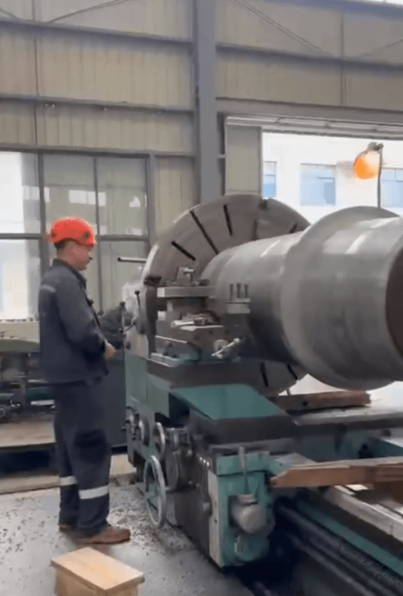 Pre machining of forging trunk tube in our German/China Greenland production